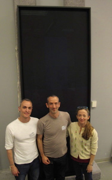 Kit Adama, Chris Bernett, and Laura Blom in front of completed painting