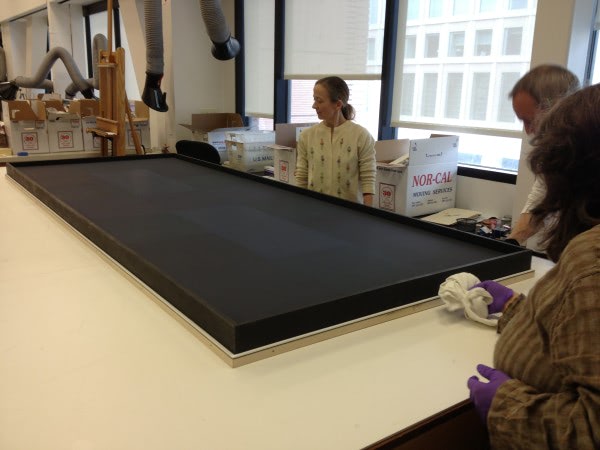 The painting on fitting day at the old SFMOMA conservation lab (from L-R, Laura, Kit, and Paula)
