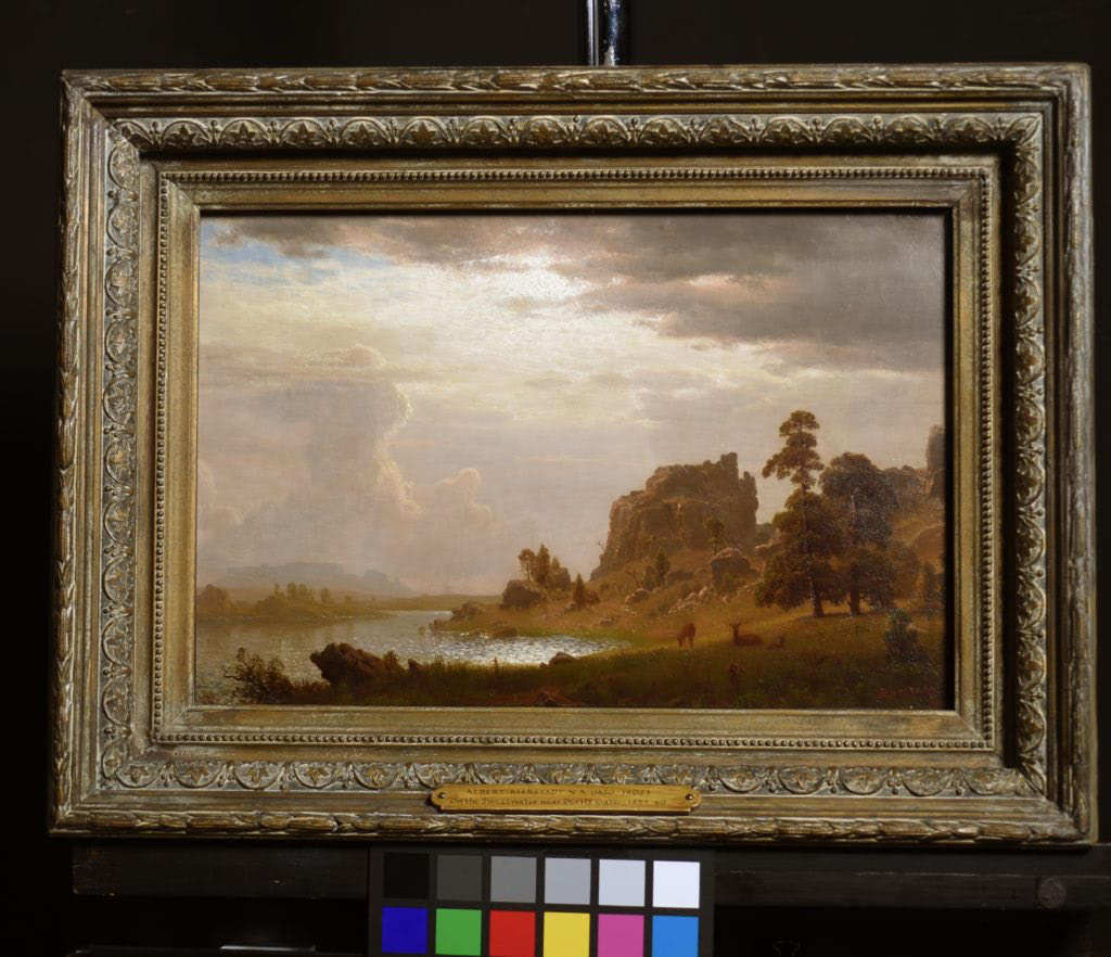 Albert Bierstadt’s On the Sweetwater Near the Devil’s Gate of 1860 after frame restoration and glazing with Optium Museum Acrylic. 