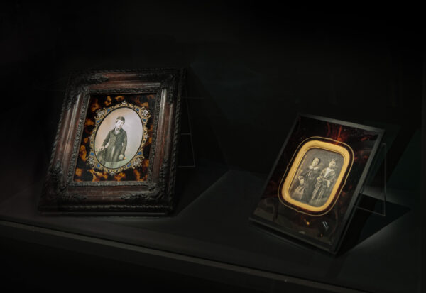 Daguerreotype portrait of a young boy (1854) by Philibert Perraud and a portrait of two women, both with painted glass / copyright FOMU, Guy Voet