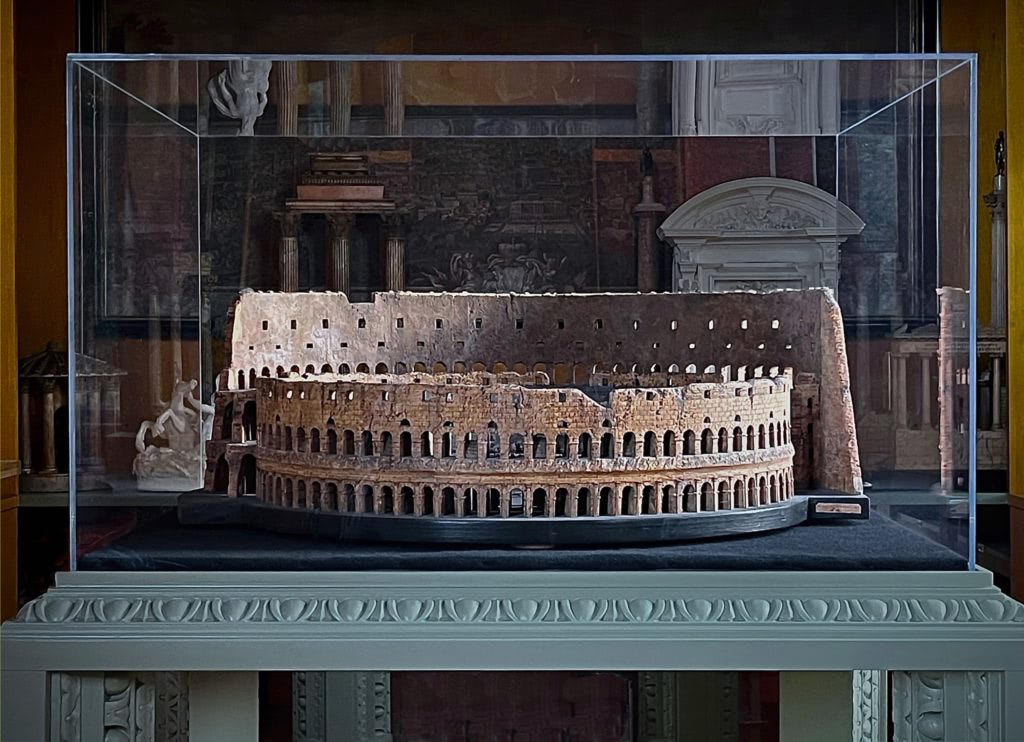 A detail of the carved cork Colosseum model under Optium cover.
