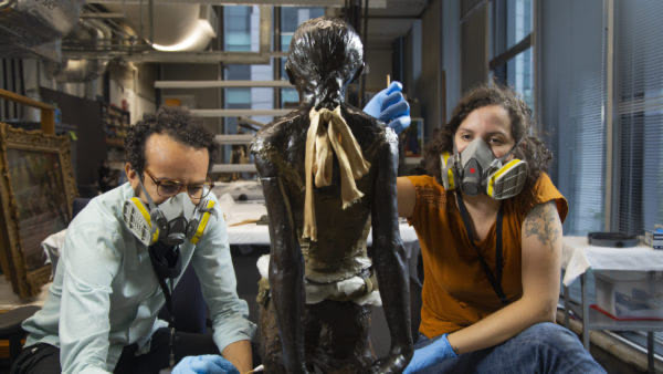 An example of conservators’ typical working conditions with selected personal protective equipment (PPE) during the cleaning process of The Little Fourteen-Year-Old Dancer by Edgar Degas