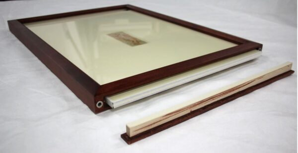 Optium package slotted into double-sided frame.