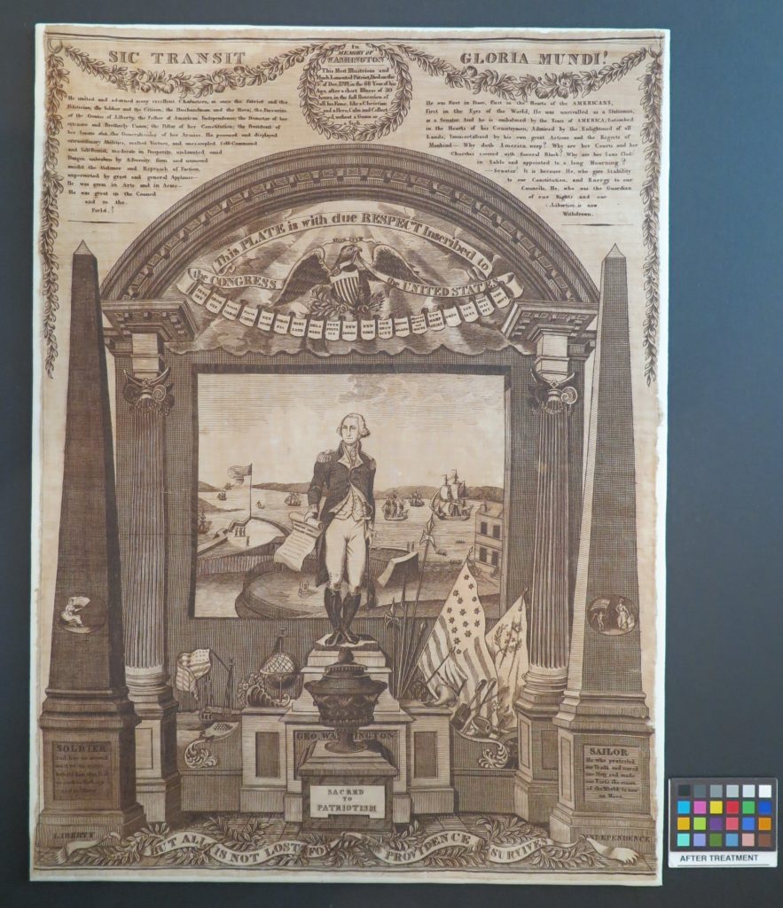 Historic copperplate print featuring an ornate design and text after conservation treatment.