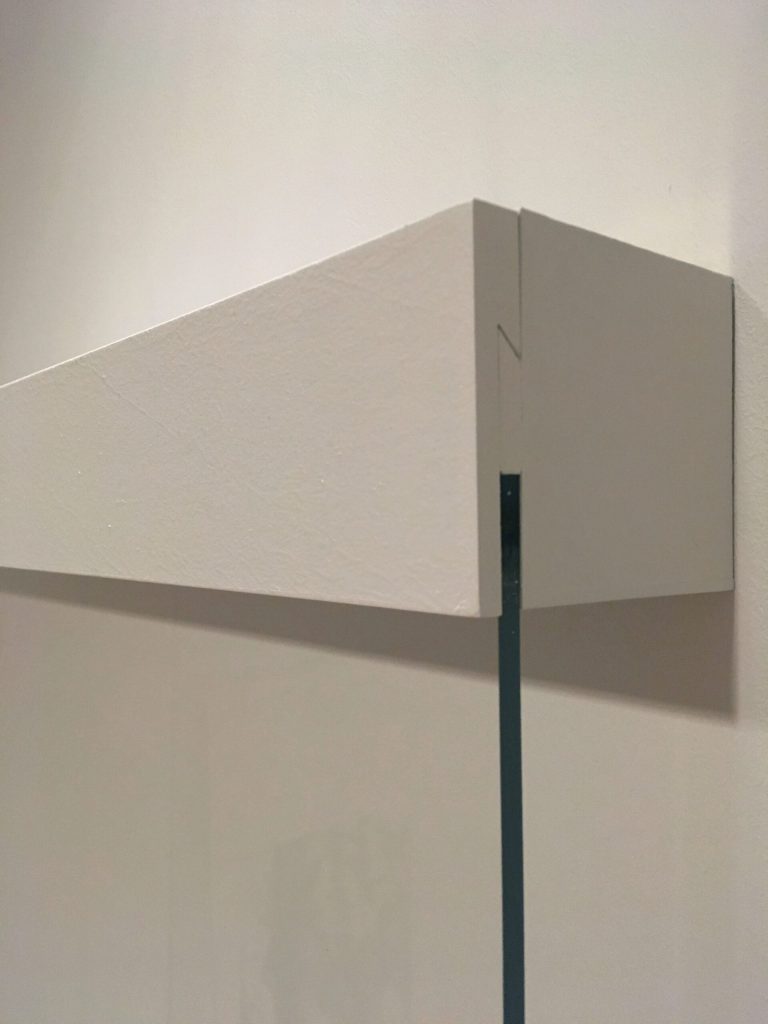 Capped and painted brackets. Photo courtesy of the Cantor Arts Center at Stanford University.