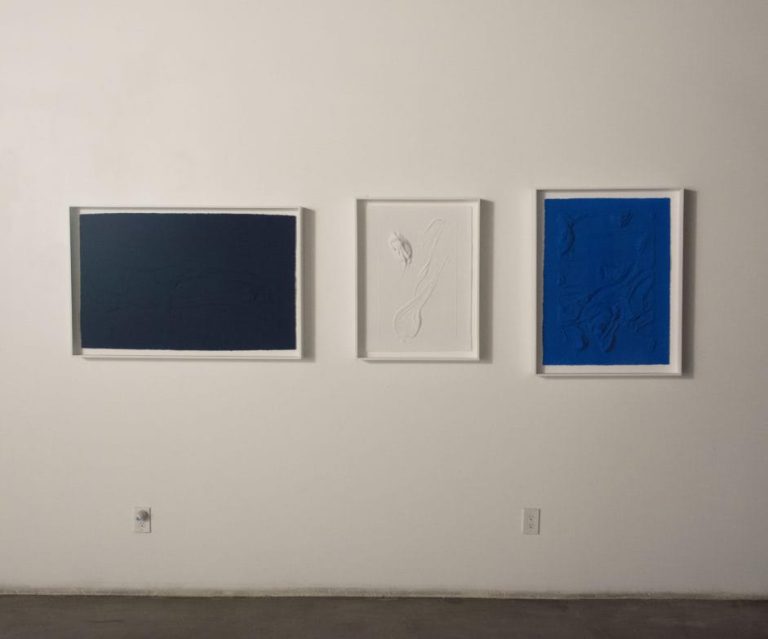Installation view of "Untitled Ultra Blue", 2014, 30.5 X 23 X 1.25 in., MixografÃa® print on handmade paper, Edition of 25. Courtesy of Mixografia.