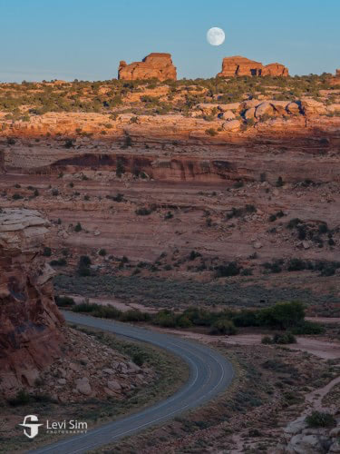 Landscape photograph by Levi Sim featuring rugged mountains and dramatic skies, ideal for TruLife Acrylic display.