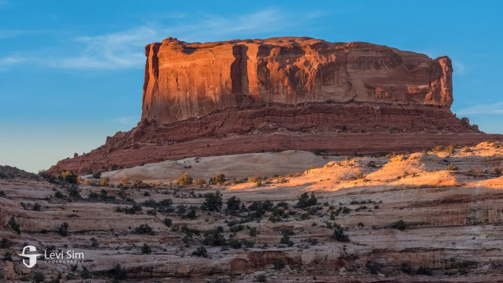 Landscape photograph by Levi Sim featuring rugged terrain and vibrant skies, ideal for TruLife Acrylic display.