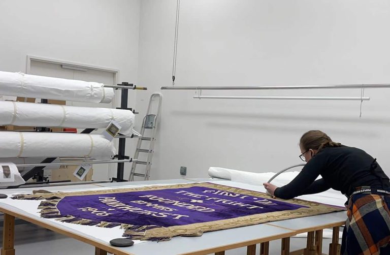 Conserving the Manchester suffragette banner "Manchester First in the Fight"