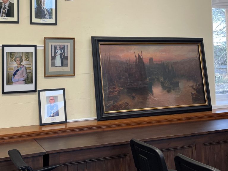 Installation view of 'St Ives Harbour, William Cox, 112 cm x 181 cm (including frame), Camborne Library. Photo courtesy of Sarah Cove, ACR