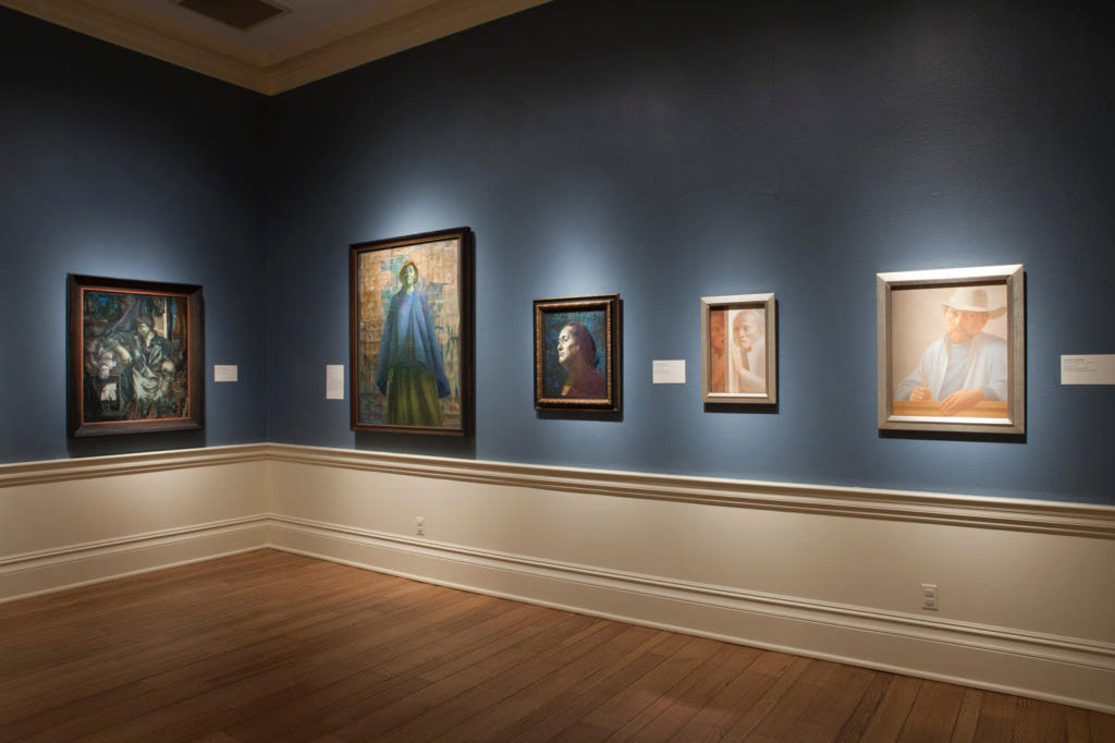 Installation view at Dixon Gallery and Gardens, Memphis (from left to right): Jules Kirschenbaum, Dark in the Forest, 1951–52 (post-treatment); Charles White, Mother Courage II, 1974; Charles White, Matriarch, 1967 (post-treatment); George Tooker, Voice II, 1972, and Self-Portrait, 1969 (both newly framed and glazed with Optium Museum Acrylic).