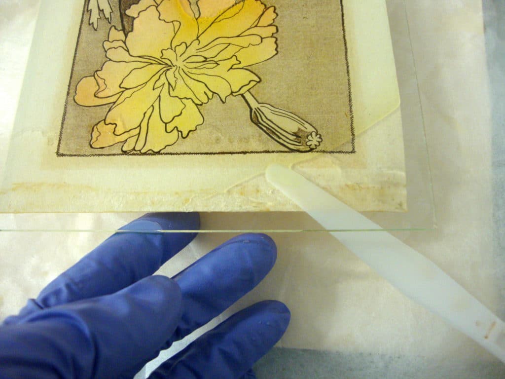 water damage to framed works on paper