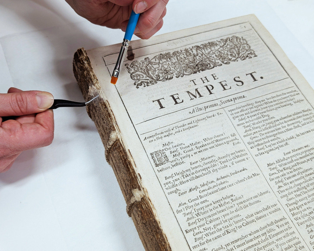 Tissue stabilization treatment applied to the shoulder of the Shakespeare First Folio textblock.