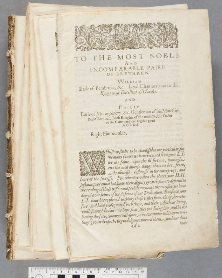 Pre-treatment image of Durham’s vandalized First Folio textblock with detached leaves stacked on top.