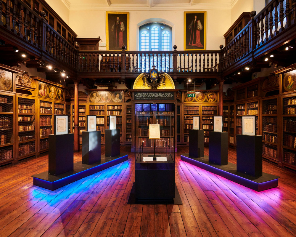 The 'Shakespeare Recovered' Exhibition featuring double‑sided Tru Vue Optium Acrylic plinths displaying detached folio leaves.