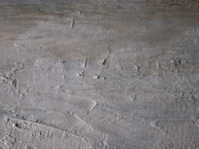 Raking light detail showing paint tenting and paint loss in the upper sky section of L. S. Lowry's Industrial Scene before conservation treatment.